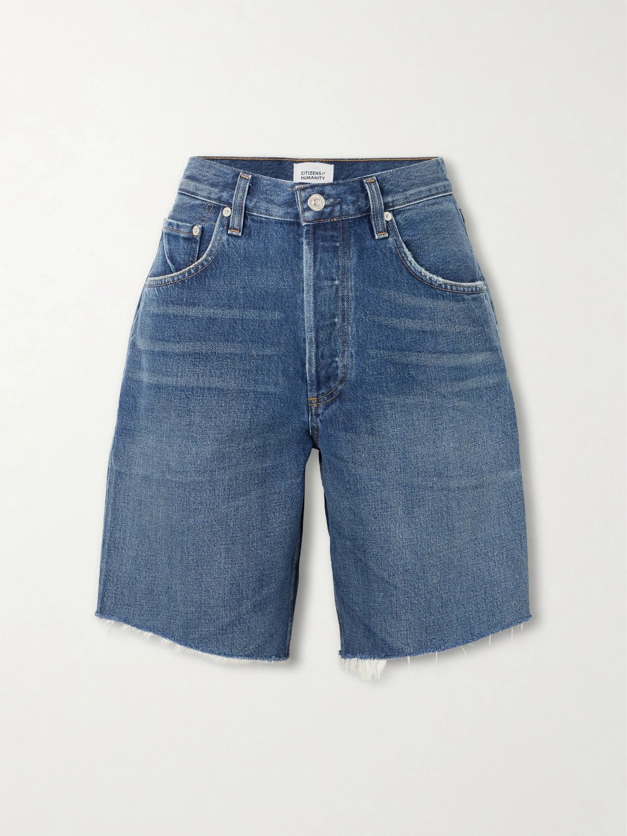 Image of a model wearing Shorts. Product name - Ayla Frayed Denim Shorts in Mid denim colour by brand - Citizens of Humanity