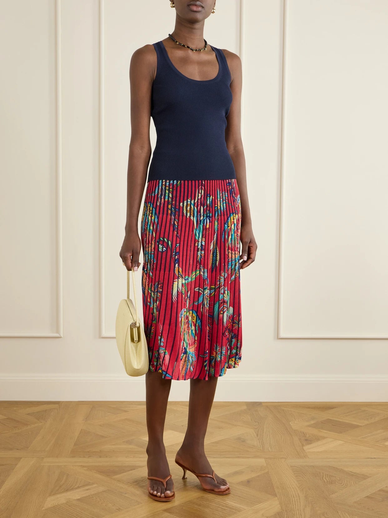 Image of a model wearing Skirts. Product name - Floral And Paisley-print Knitted Midi Skirt in Red colour by brand - Etro