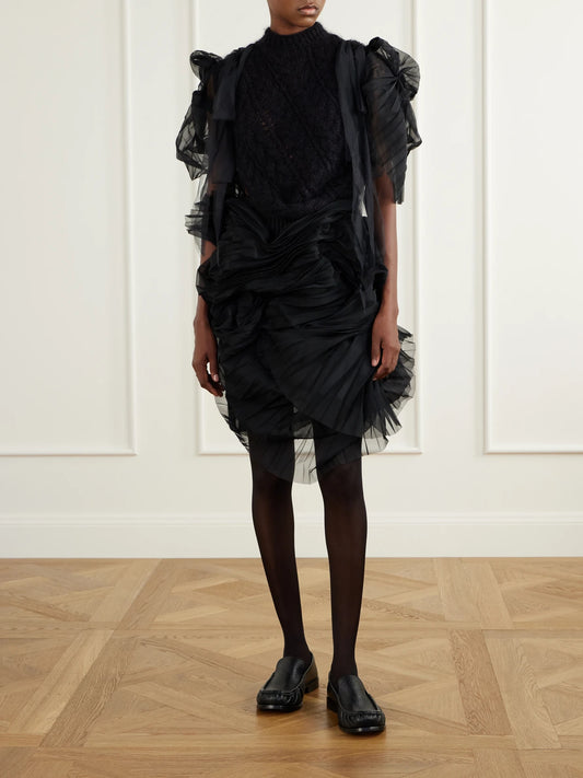 Image of a model wearing Skirts. Product name - Minna Eerie Ruched Tulle Knee-length Skirt in Black colour by brand - Pauline Dujancourt