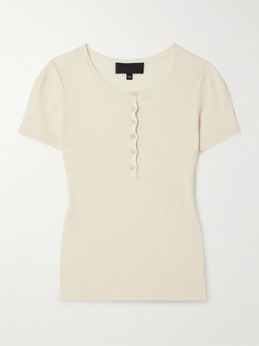 Image of a model wearing Tops. Product name - Francene Ribbed Silk Henley T-shirt in Ivory colour by brand - Nili Lotan