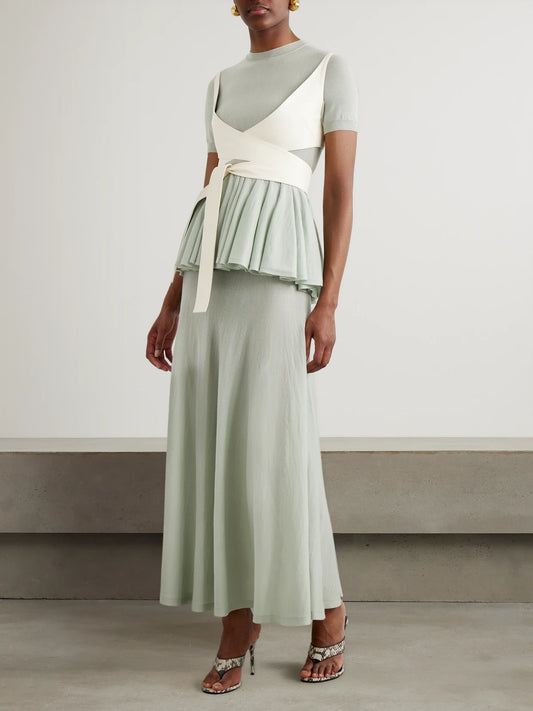 Image of a model wearing Skirts. Product name - Wool-blend Maxi Skirt in Sage green colour by brand - Alaïa