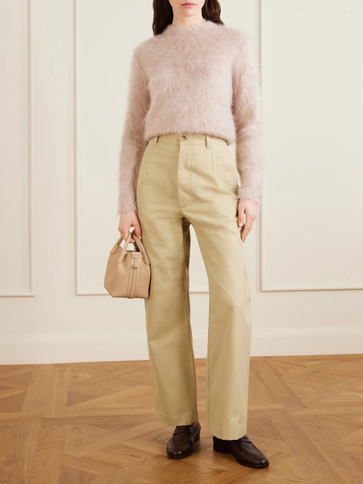 Image of a model wearing Pants. Product name - Yoko Cropped Cotton-poplin Pants in Beige colour by brand - Loro Piana