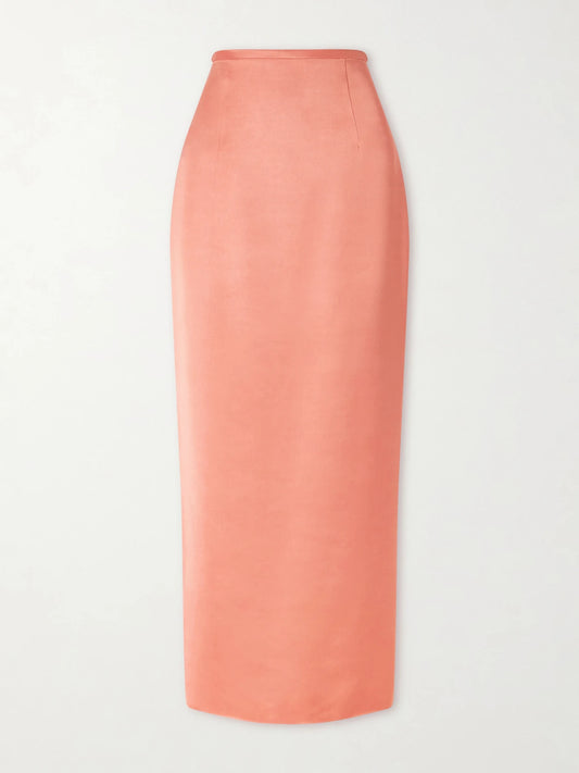 Image of a model wearing Skirts. Product name - Winton Satin Midi Skirt in Coral colour by brand - KHAITE