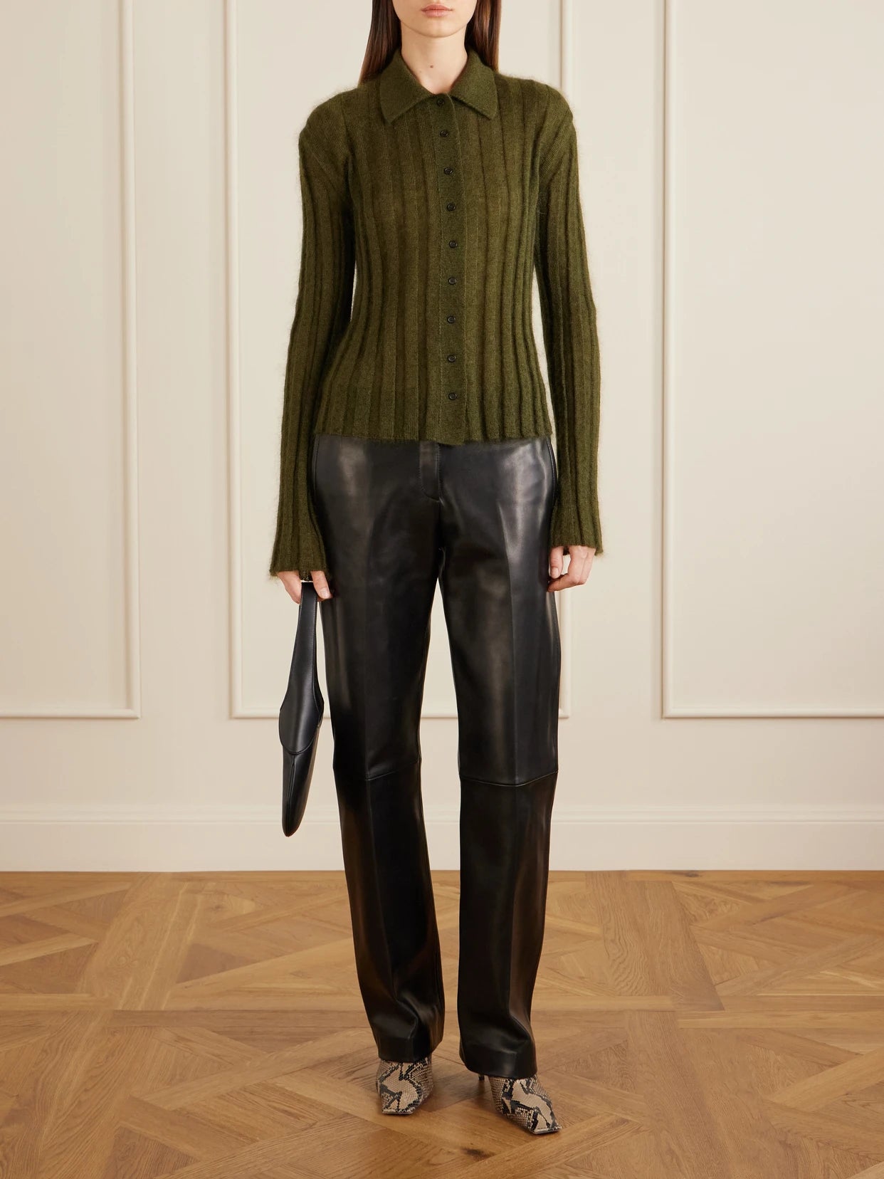 Image of a model wearing Outerwear. Product name - Meadow Ribbed Mohair And Silk-blend Cardigan in Army green colour by brand - KHAITE