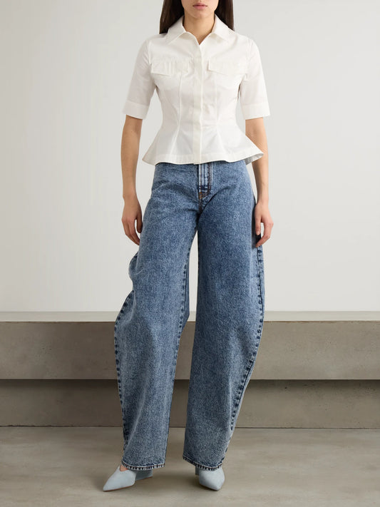 Image of a model wearing Tops. Product name - Paneled Cotton-poplin Peplum Shirt in White colour by brand - Alaïa
