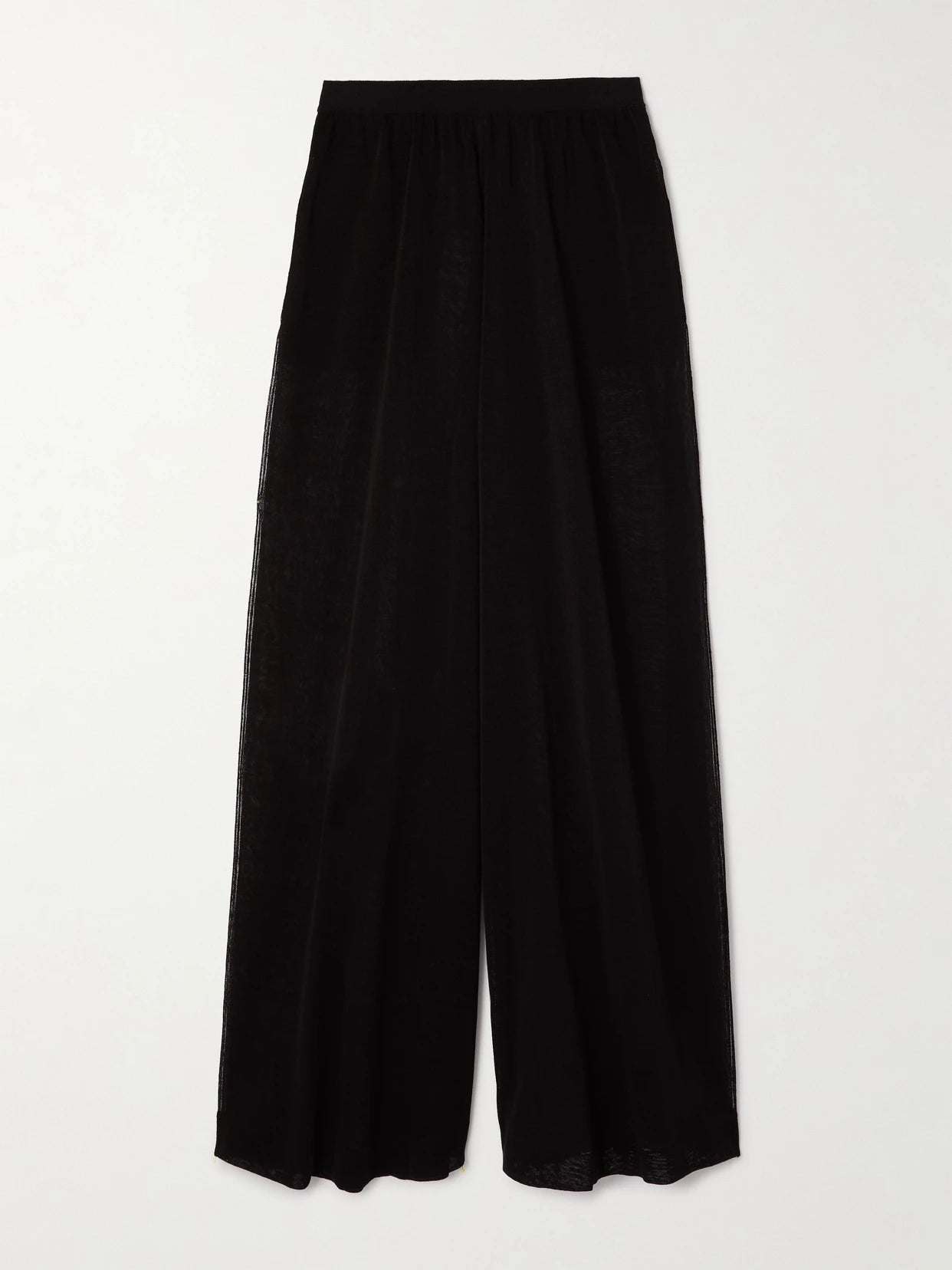 Image of a model wearing Pants. Product name - Linen And Silk-blend Wide-leg Pants in Black colour by brand - Alaïa