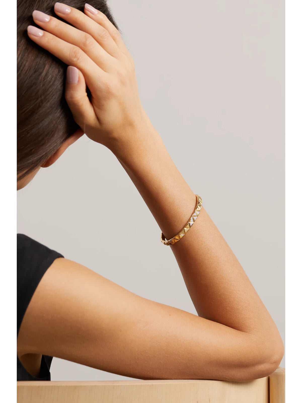Image of Bracelets. Product name - Triangolini 18-karat Gold Diamond Bangle in Multi colour by brand - Marina B