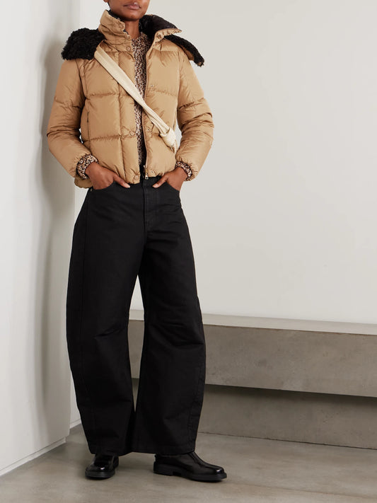 Image of a model wearing Outerwear. Product name - Archivio Dna Appliquéd Wool Sweater in Light brown colour by brand - Moncler