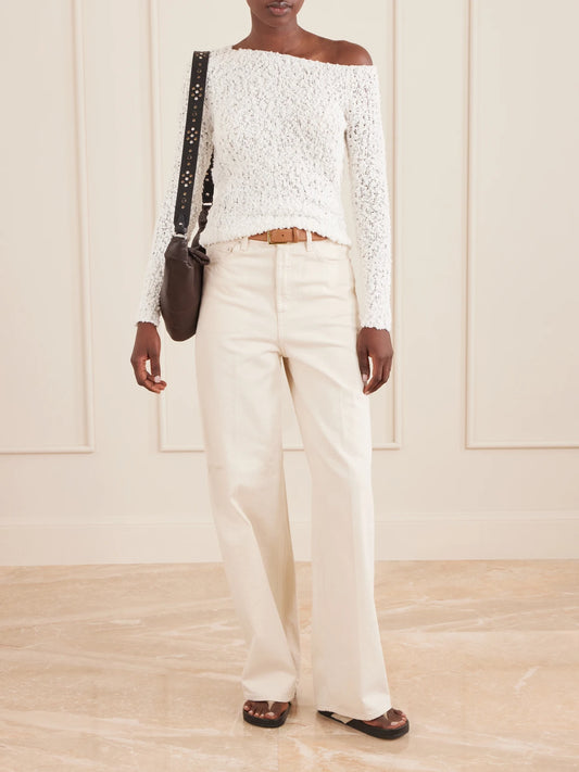 Image of a model wearing Outerwear. Product name - Vine Off-the-shoulder Cotton-blend Bouclé Sweater in Cream colour by brand - The Elder Statesman