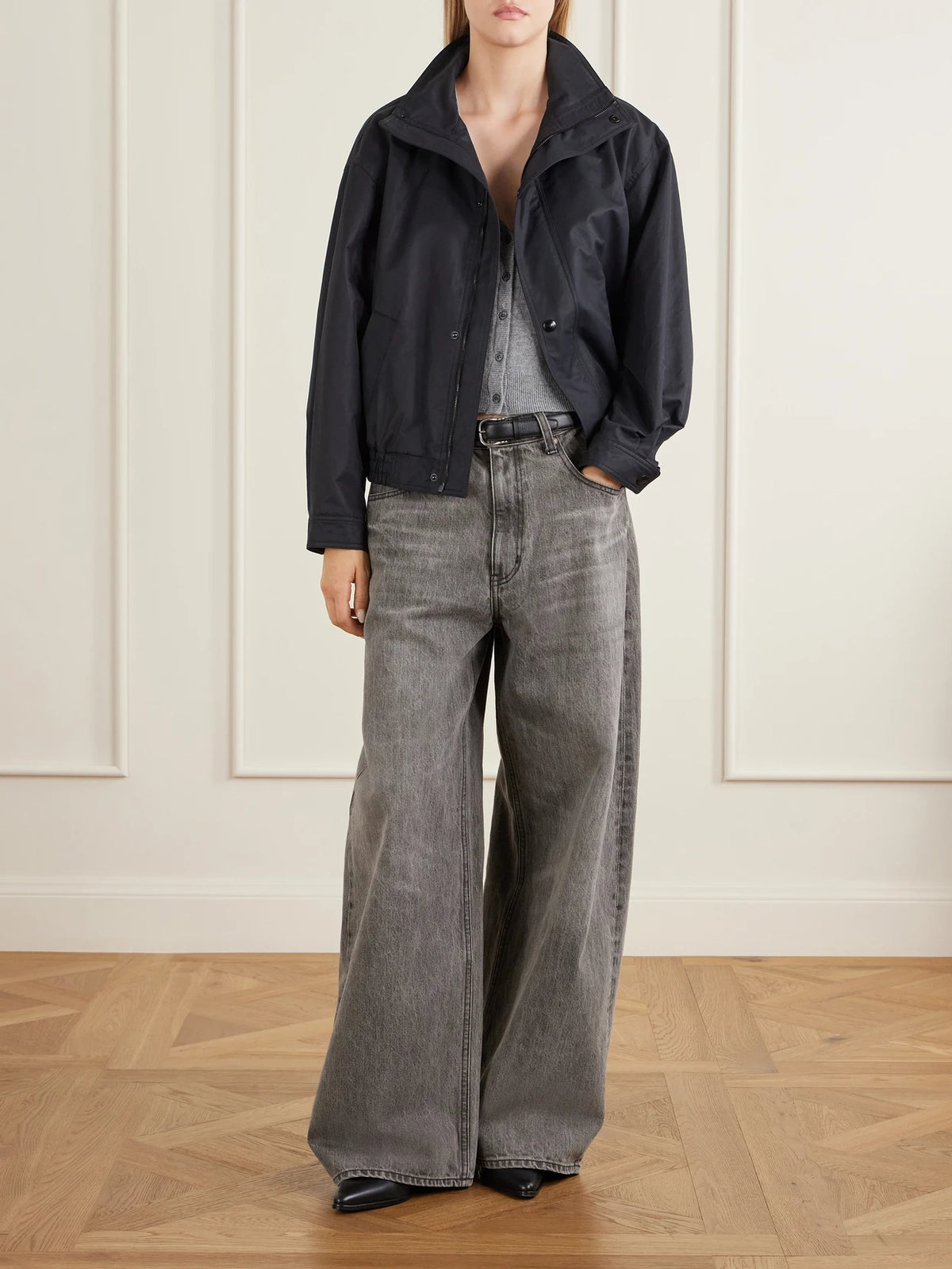 Image of a model wearing Outerwear. Product name - Porter Cashmere Sweater Vest in Light gray colour by brand - Nili Lotan