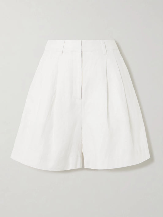 Image of a model wearing Shorts. Product name - Marchello Pleated Linen Shorts in Ivory colour by brand - Posse