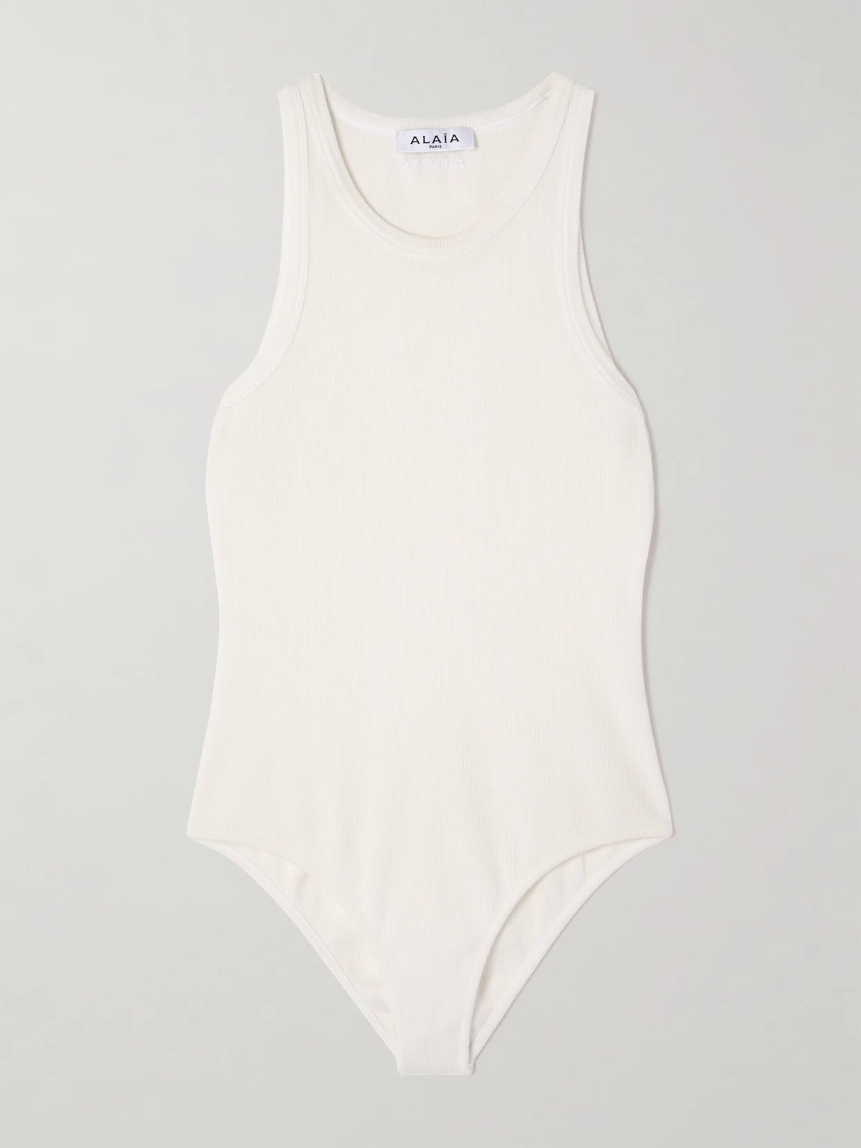 Image of a model wearing Tops. Product name - Ribbed-knit Bodysuit in Off-white colour by brand - Alaïa