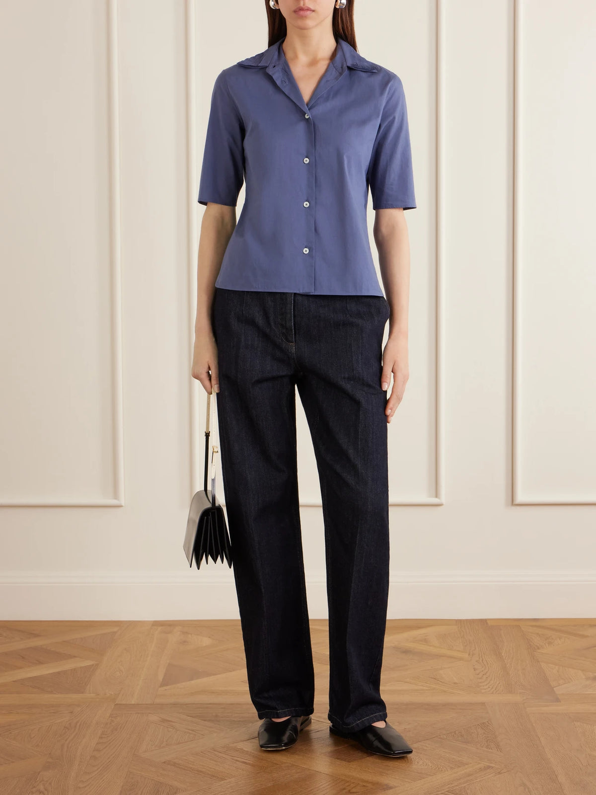 Image of a model wearing Tops. Product name - Pleated Cotton Shirt in Blue colour by brand - Jil Sander