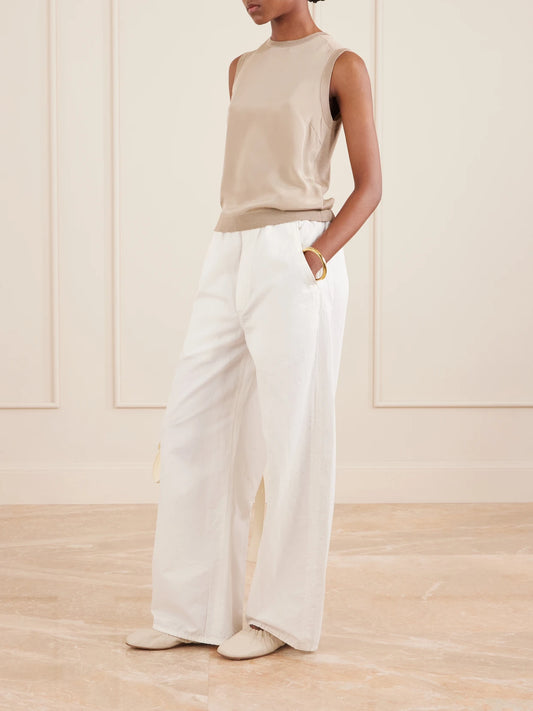 Image of a model wearing Tops. Product name - Silk-blend Tank Top in Stone colour by brand - Max Mara