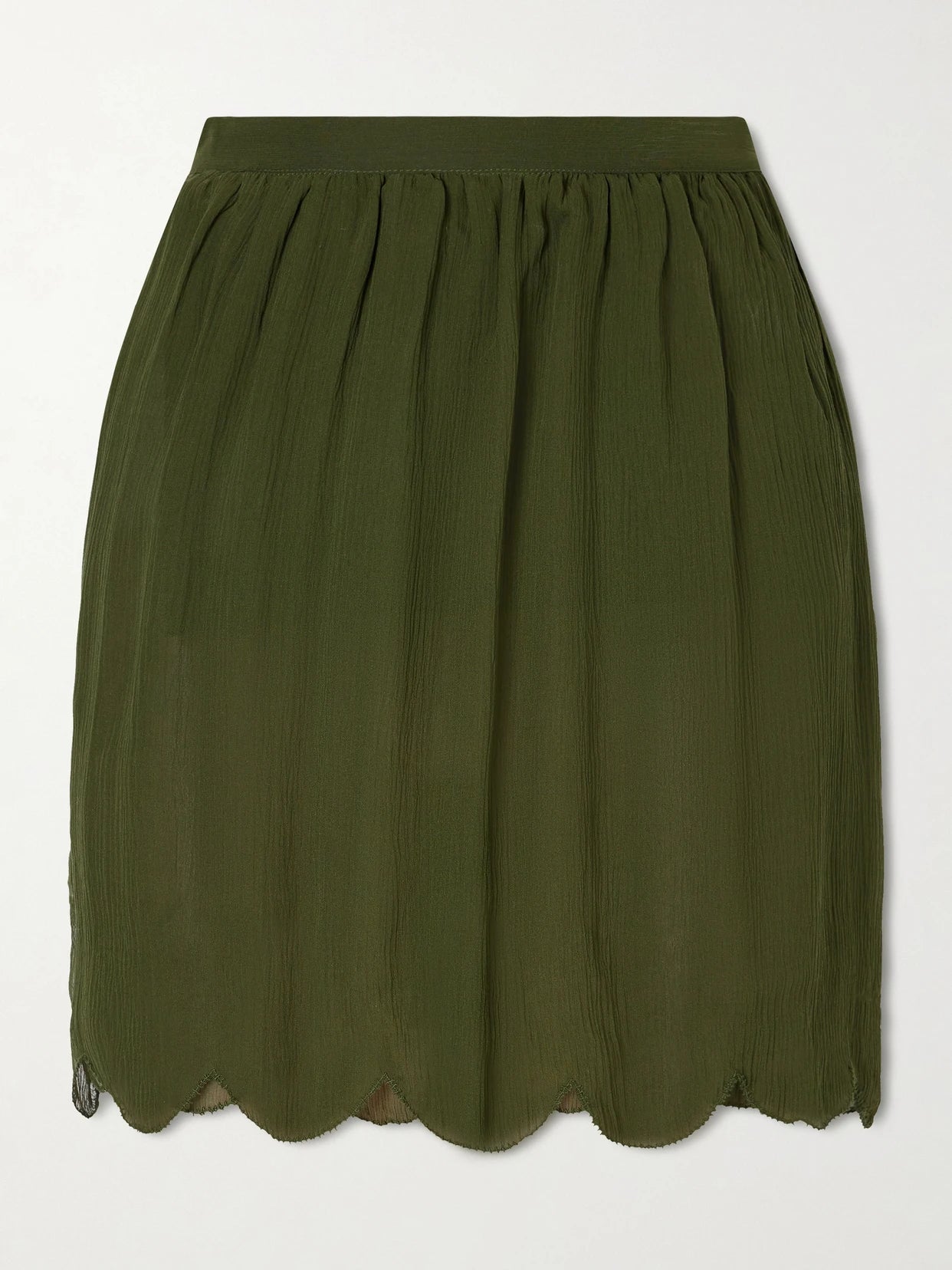 Image of a model wearing Skirts. Product name - Mab Scalloped Gathered Silk-crepon Mini Skirt in Forest green colour by brand - BODE