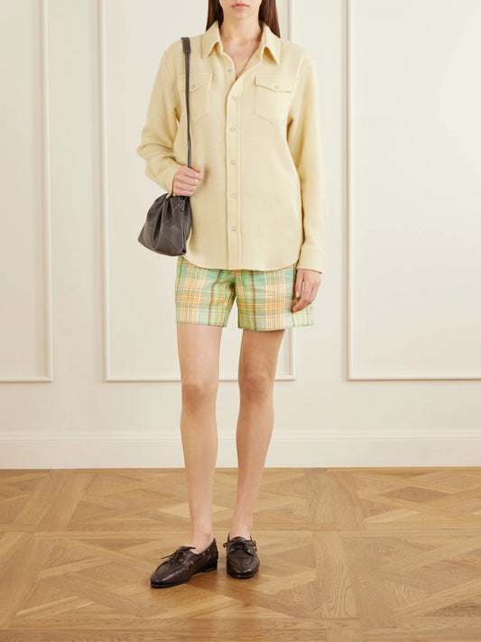 Image of a model wearing Tops. Product name - Daffodil Cashmere Shirt in Yellow colour by brand - God's True Cashmere
