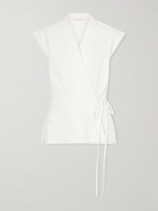 Image of a model wearing Tops. Product name - Wrap Cotton-blend Shirt in White colour by brand - Carolina Herrera