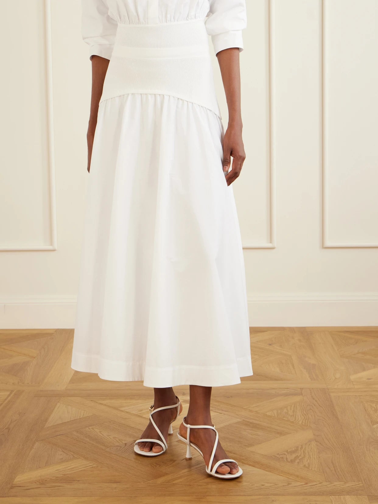 Ovie Pleated Ribbed Cotton-poplin Midi Skirt