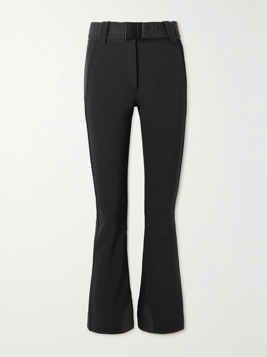 Image of a model wearing Pants. Product name - Pippa Belted Flared Ski Pants in Black colour by brand - Goldbergh