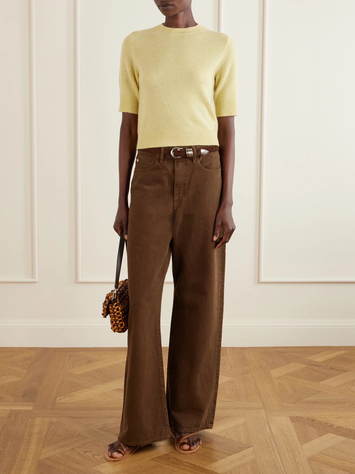 Image of a model wearing Outerwear. Product name - Chypre Cashmere Sweater in Yellow colour by brand - Le Kasha