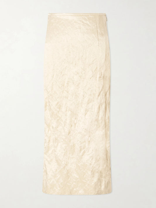 Image of a model wearing Skirts. Product name - Mena Cloqué Cotton-blend Midi Skirt in Ivory colour by brand - FFORME