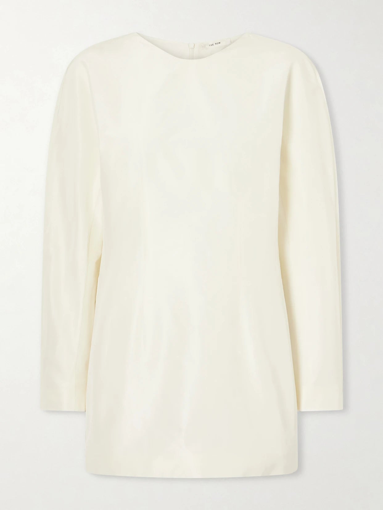 Image of a model wearing Tops. Product name - Elione Cotton And Silk Blouse in White colour by brand - The Row