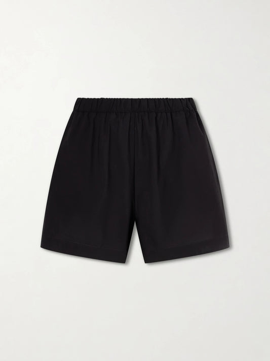 Image of a model wearing Shorts. Product name - Cotton Shorts in Black colour by brand - Lido