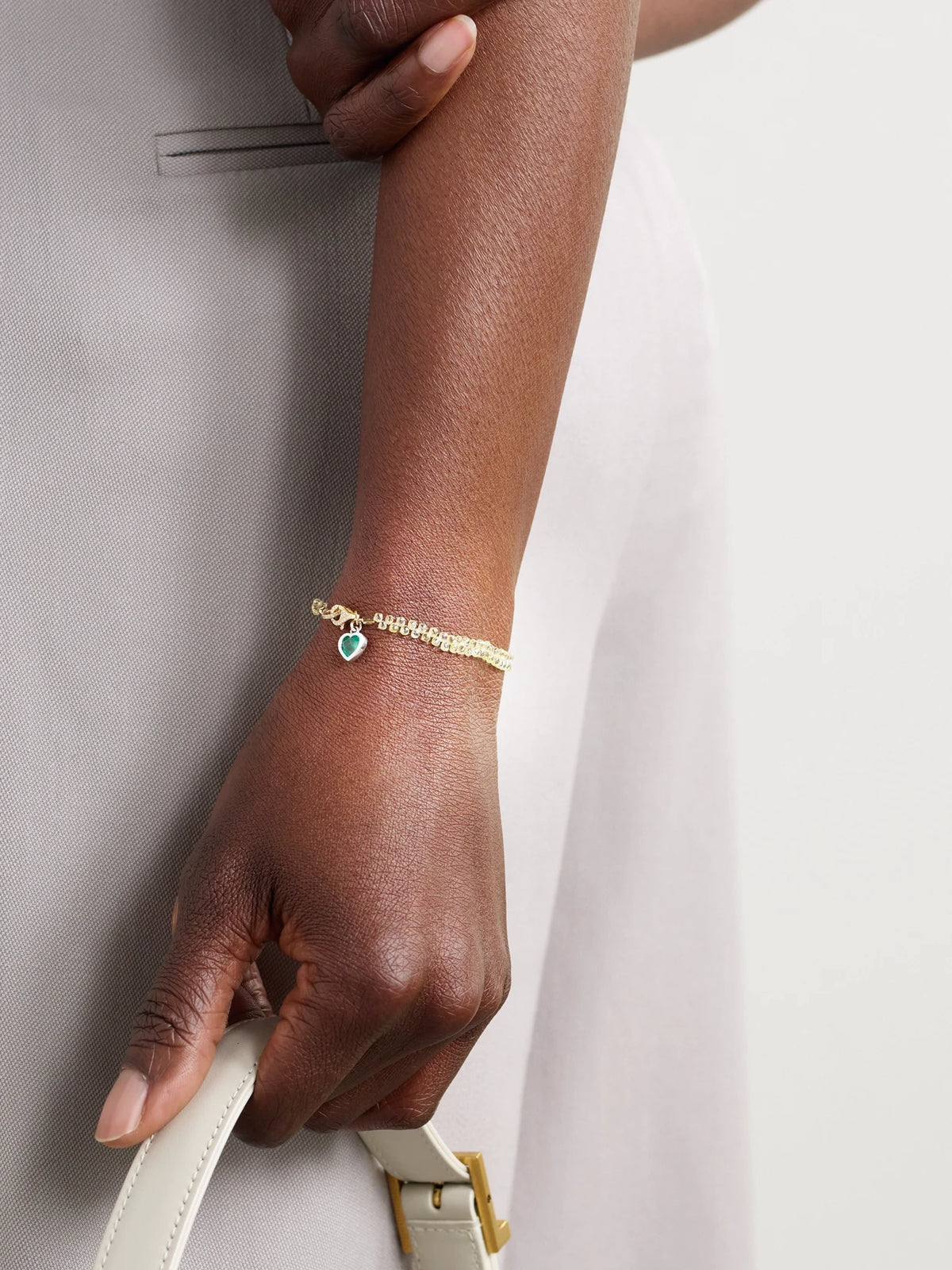 Image of Bracelets. Product name - 18-karat Yellow And White Gold, Diamond And Emerald Bracelet in Multi colour by brand - Kamyen