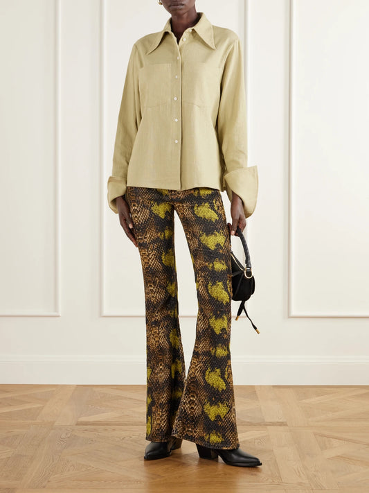 Image of a model wearing Tops. Product name - Delta Cotton Broken Twill Shirt in Green colour by brand - ALIX OF BOHEMIA