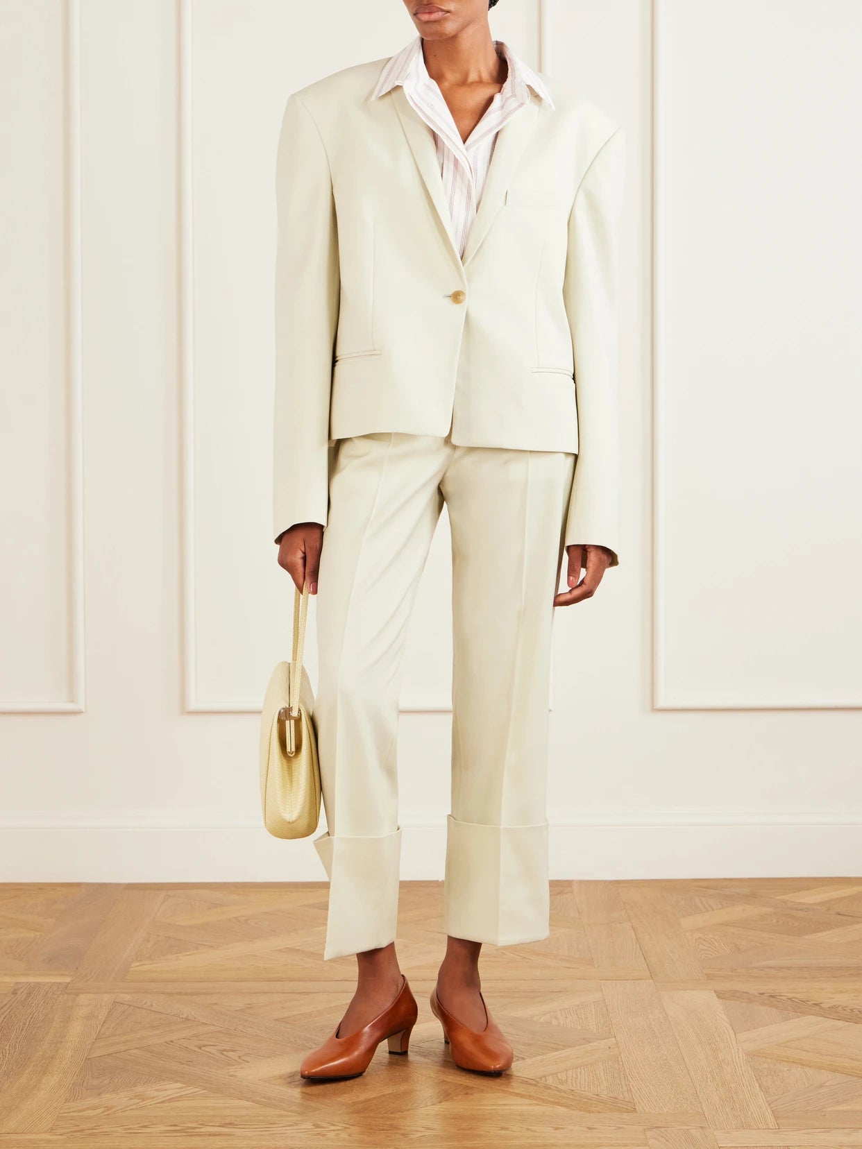 Image of a model wearing Pants. Product name - Ramie-blend Twill Straight-leg Pants in Beige colour by brand - Calvin Klein Collection