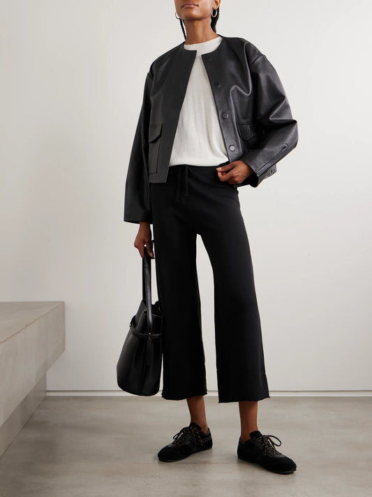 Image of Sleepwear & Loungewear. Product name - Kiki Cropped Voile-trimmed Cotton-jersey Track Pants in Black colour by brand - Nili Lotan