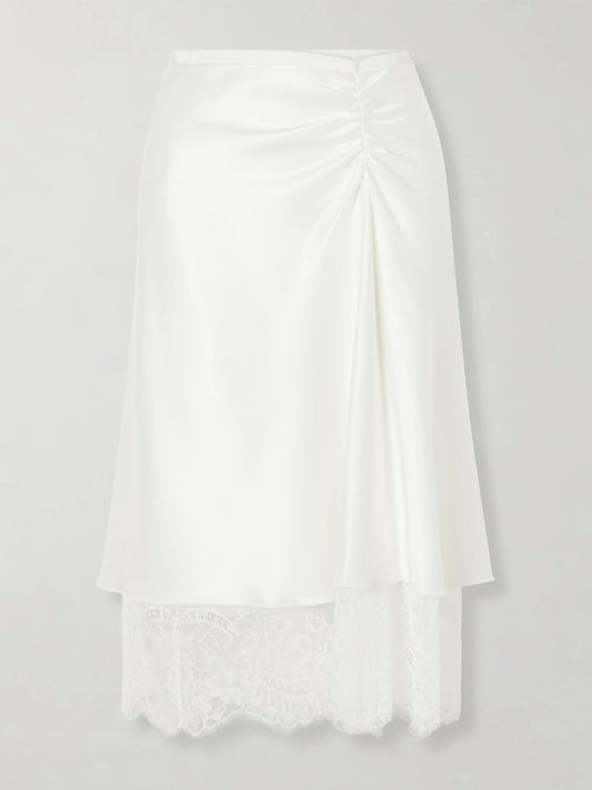 Image of a model wearing Skirts. Product name - Ingrid Layered Gathered Lace-trimmed Satin Midi Skirt in Ivory colour by brand - SIR.