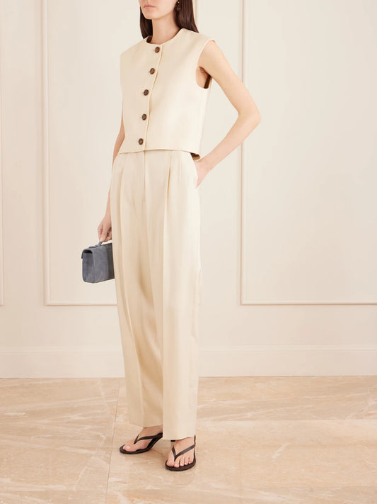 Image of Coats & Jackets. Product name - Danae Woven Vest in Beige colour by brand - BLAZÉ Milano