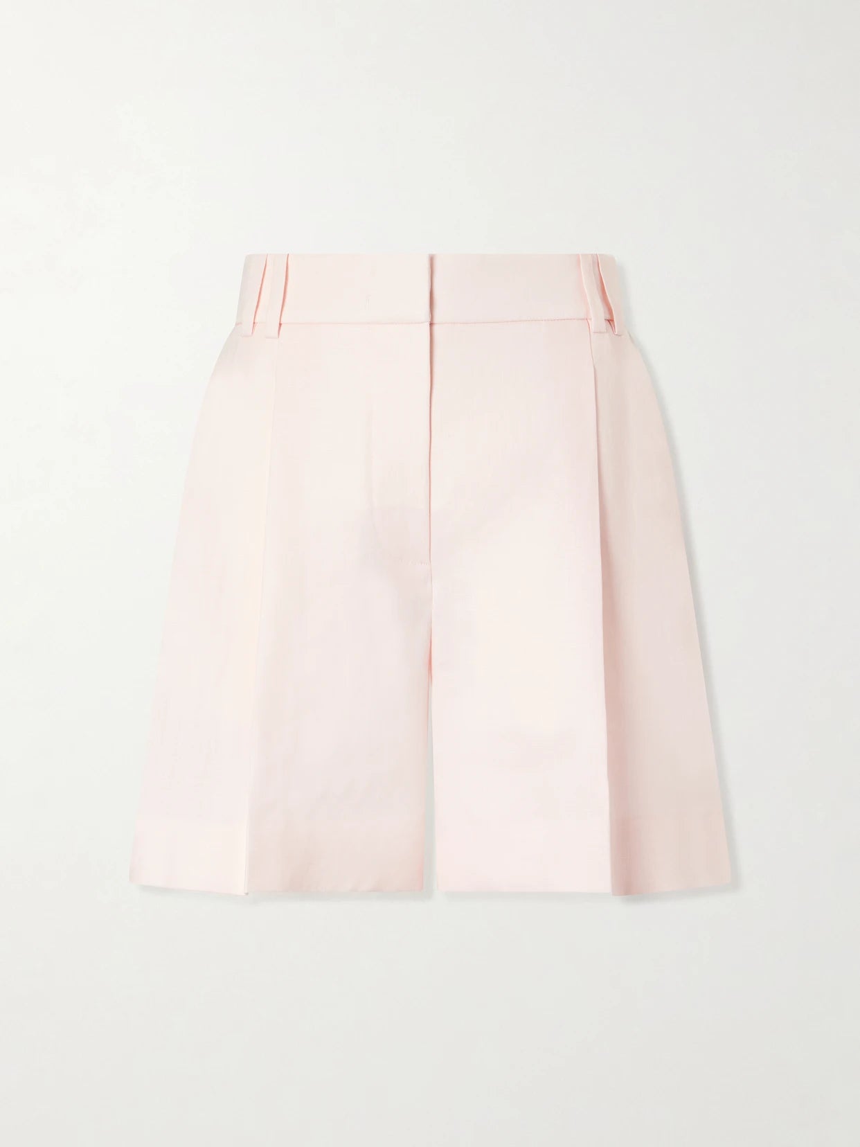 Image of a model wearing Shorts. Product name - Pleated Linen Shorts in Pastel pink colour by brand - Another Tomorrow