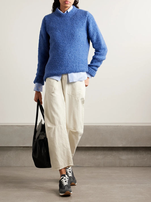 Image of a model wearing Outerwear. Product name - Cloud Cashmere-bouclé Sweater in Blue colour by brand - God's True Cashmere