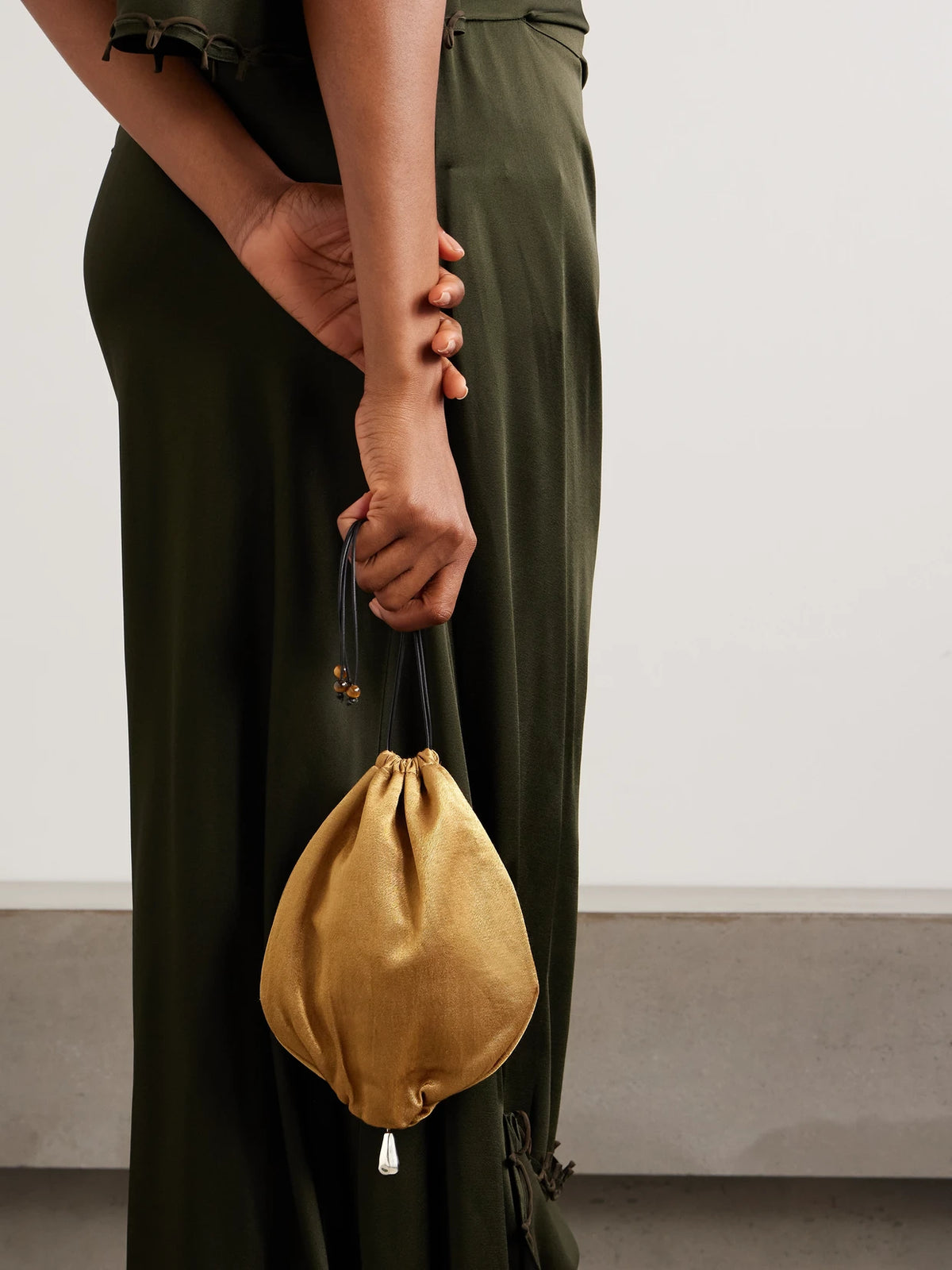 Image of Wallets & Money Clips. Product name - Teardrop Embellished Satin Drawstring Pouch in Bronze colour by brand - Sophie Buhai