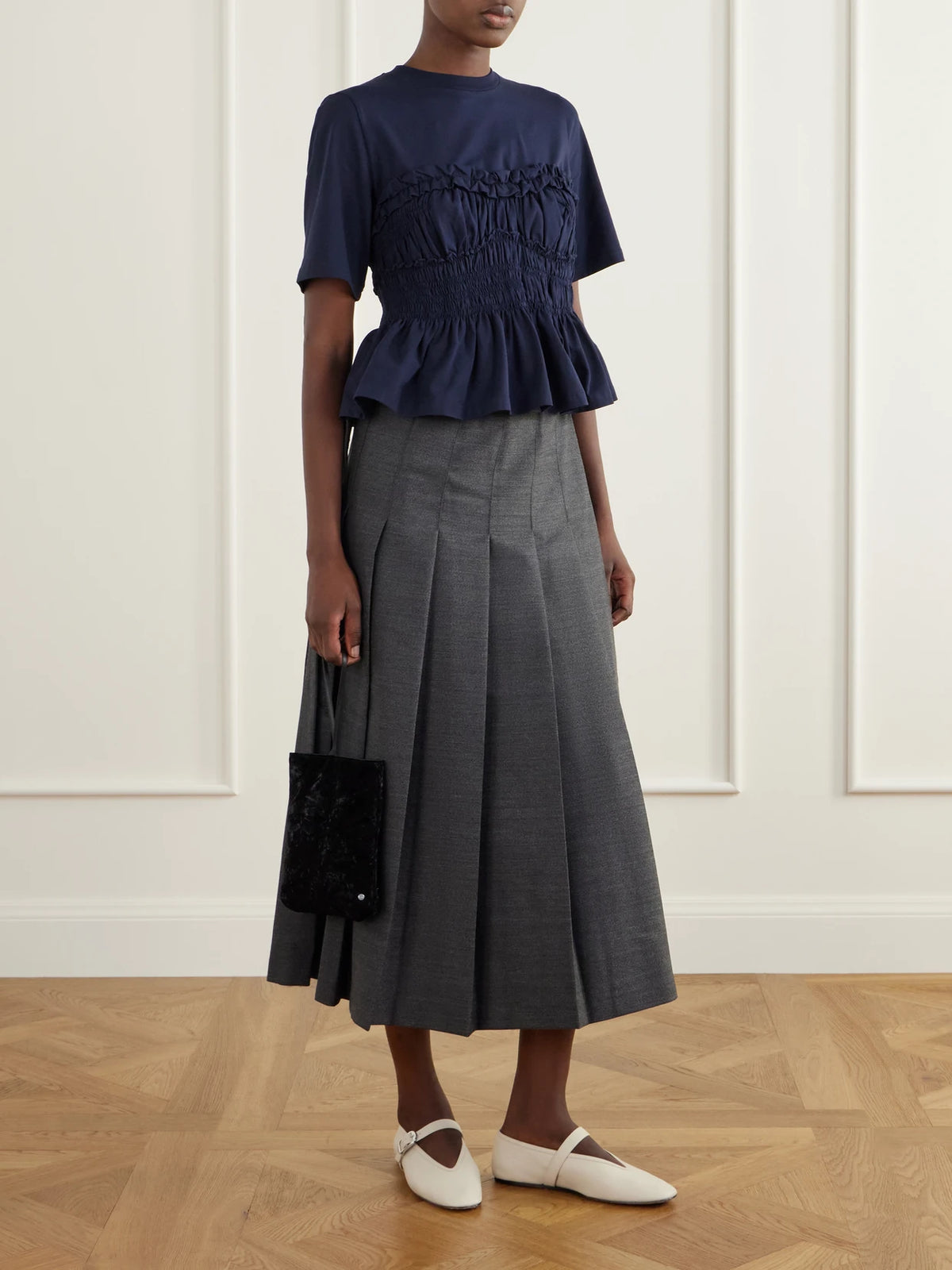 Image of a model wearing Tops. Product name - Vilde Gathered Cotton-stretch Jersey T-shirt in Navy colour by brand - Cecilie Bahnsen