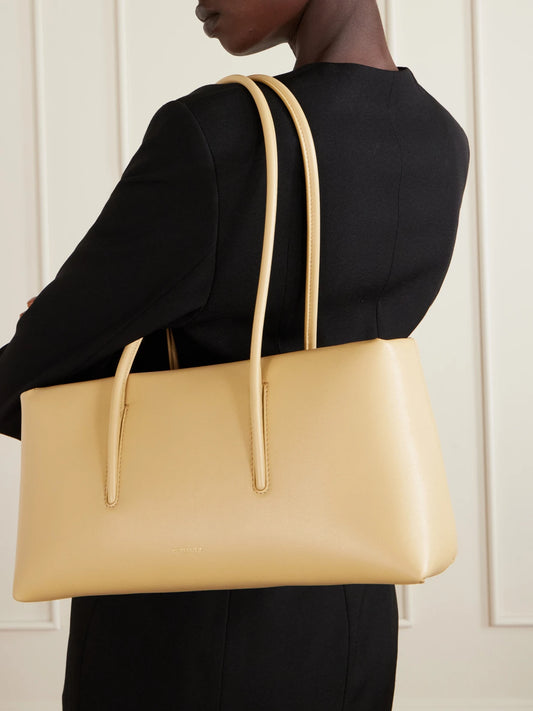 Image of Bags. Product name - The Stockholm Full Grain Leather Shoulder Bag in Neutral colour by brand - DeMellier