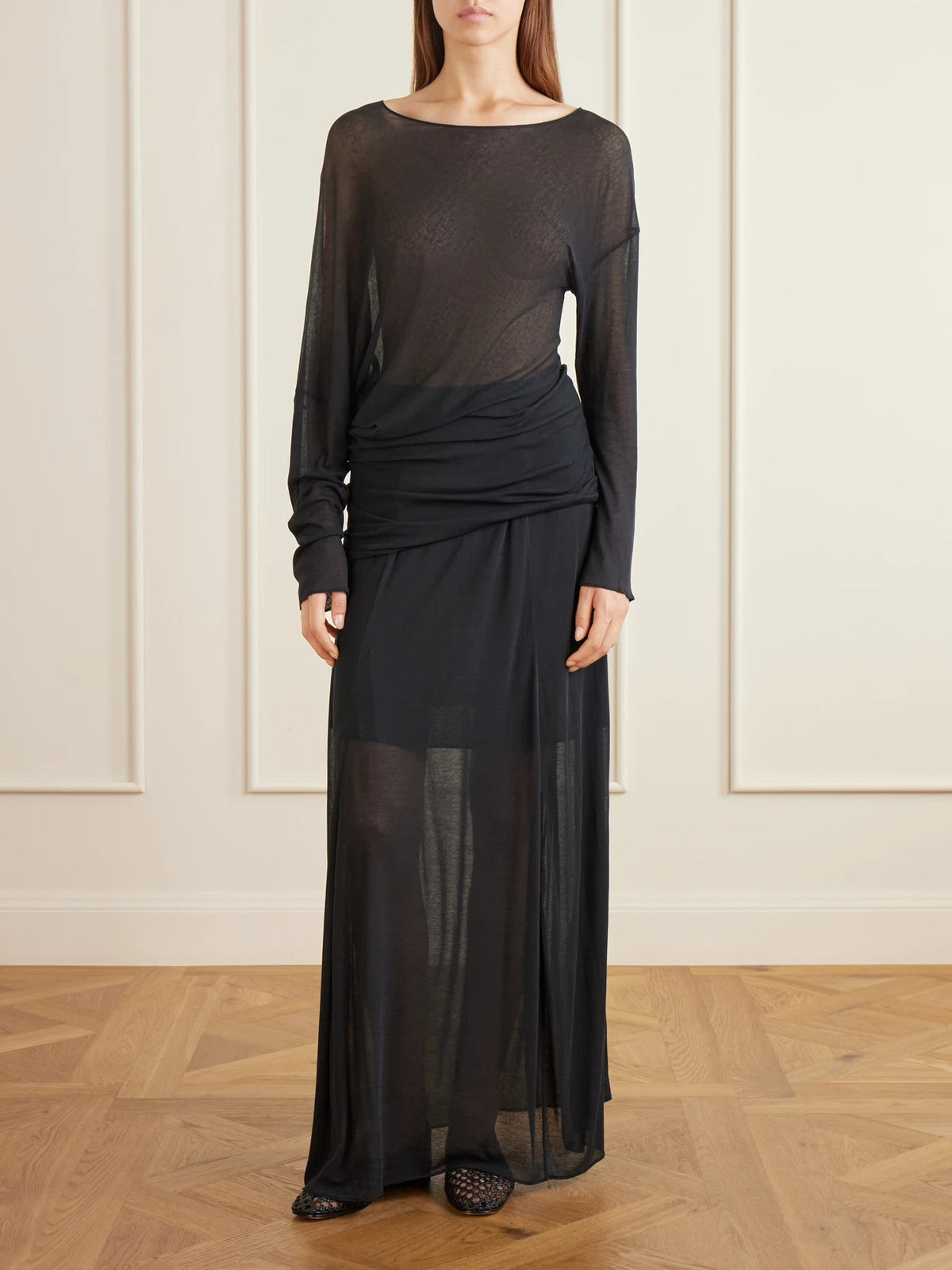 Image of a model wearing Skirts. Product name - Cocoon Cotton-voile Maxi Skirt in Black colour by brand - Ruohan