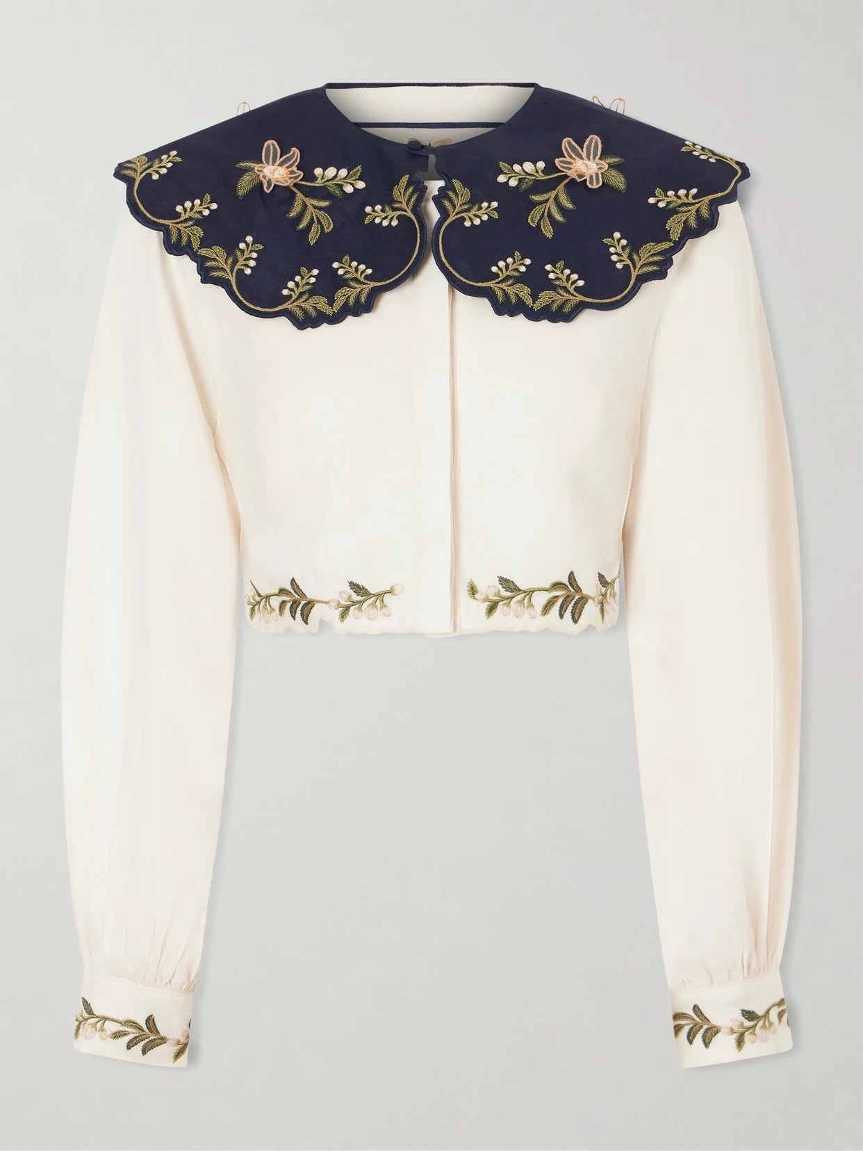Image of Shirts. Product name - Cumbre Floral-embroidered Appliquéd Tiered Linen Shirt in Cream colour by brand - Agua by Agua Bendita