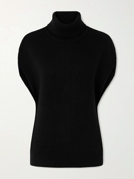Image of a model wearing Outerwear. Product name - Wool-blend Turtleneck Sweater in Black colour by brand - TOTEME