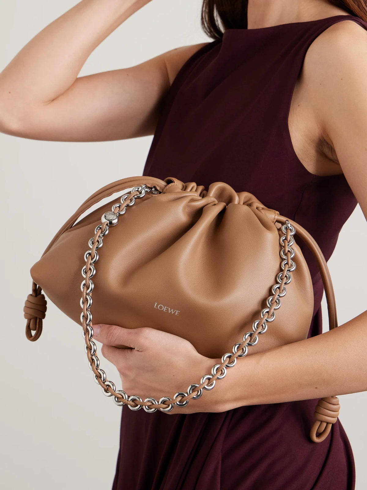 Image of Bags. Product name - Flamenco Medium Leather Clutch in Beige colour by brand - LOEWE