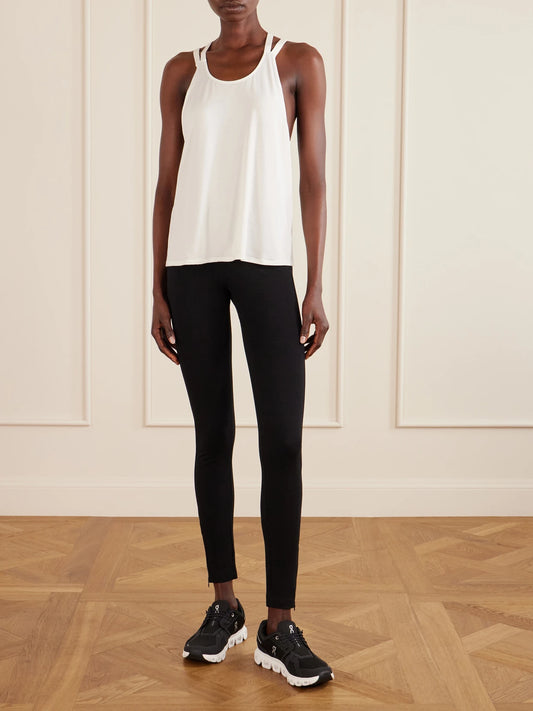Image of a model wearing Tops. Product name - Allyson Embroidered Stretch Jersey Tank Top in White colour by brand - Eres