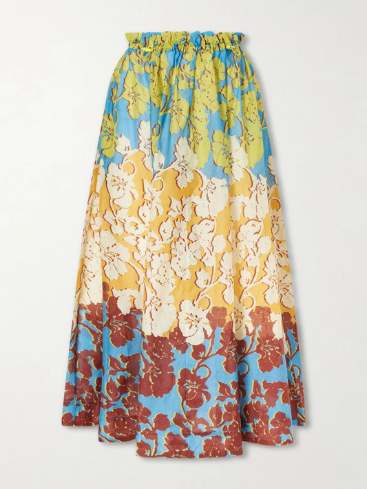 Image of a model wearing Skirts. Product name - Splice Floral-print Cotton And Silk-blend Midi Skirt in Multi colour by brand - ALÉMAIS