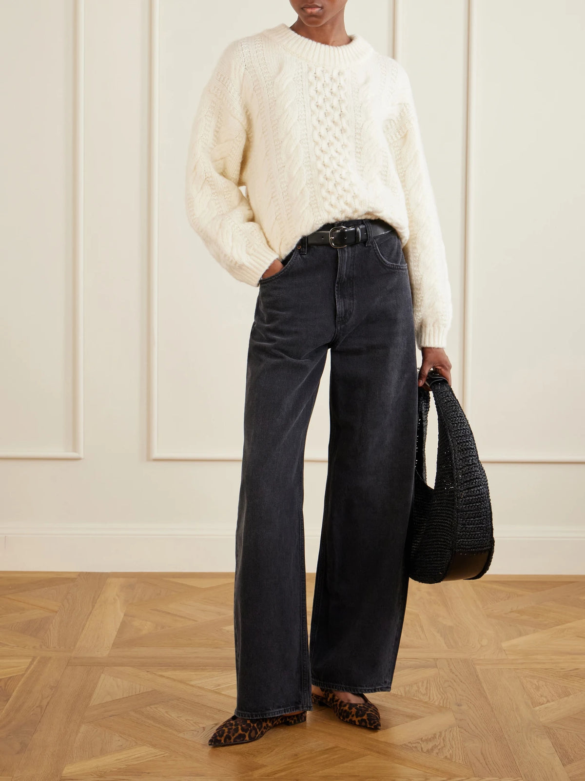Image of a model wearing Outerwear. Product name - Hallstatt Cable-knit Wool And Cashmere-blend Sweater in Ivory colour by brand - DÔEN