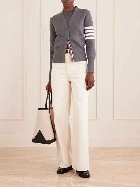 Image of a model wearing Outerwear. Product name - Grosgrain-trimmed Striped Cotton Cardigan in Gray colour by brand - Thom Browne
