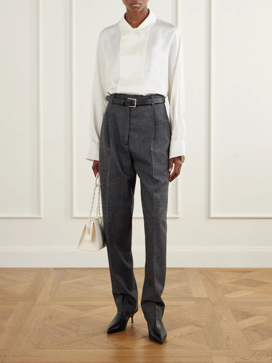 Image of a model wearing Pants. Product name - Daria Pleated Wool-blend Tapered Pants in Gray colour by brand - RÓHE