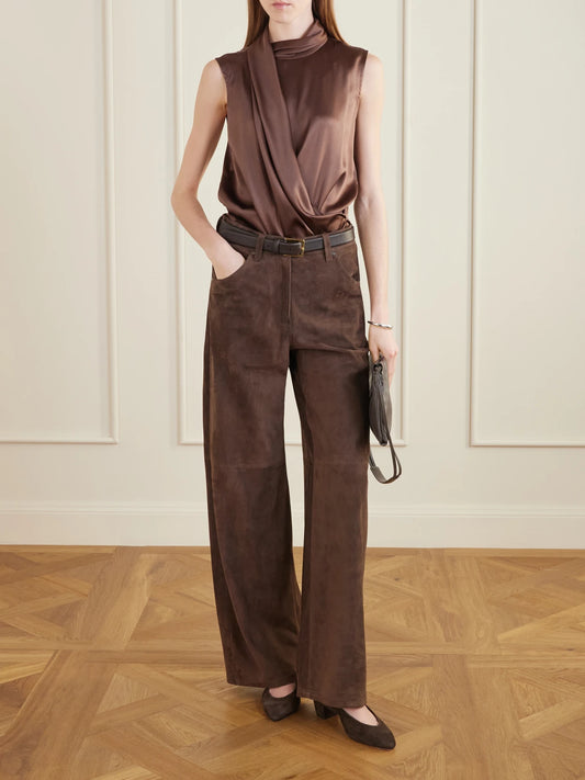 Image of a model wearing Pants. Product name - Mid-rise Straight-leg Suede Pants in Brown colour by brand - Brunello Cucinelli