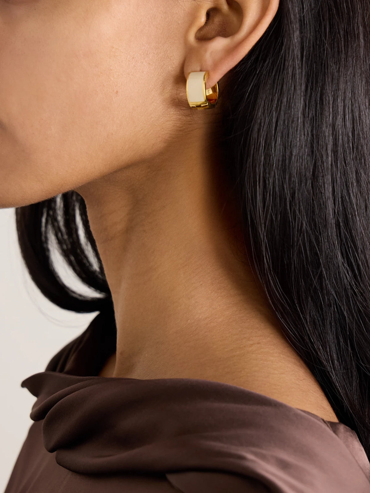Image of Earrings. Product name - Gold-plated Enamel Hoop Earrings in Off-white colour by brand - TOTEME