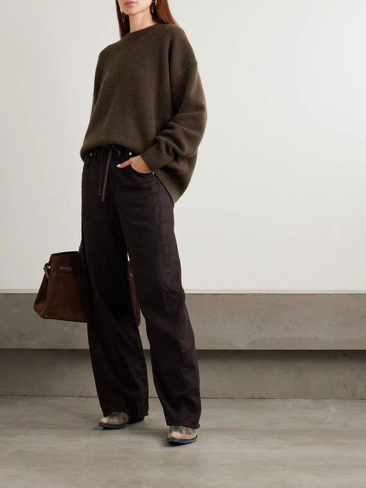 Image of a model wearing Outerwear. Product name - Islington Cashmere Sweater in Brown colour by brand - Arch4